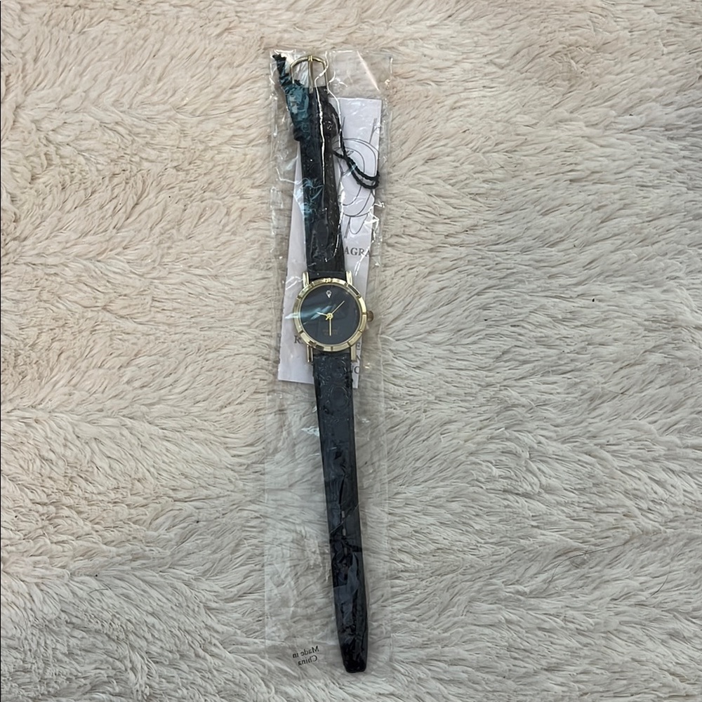 Elegant Black and Gold Women's Watch